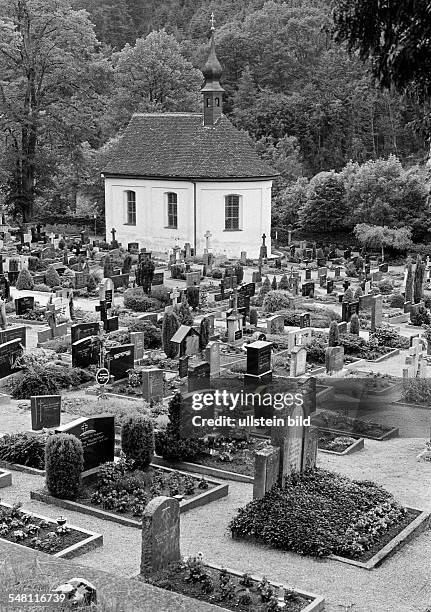 People, death, mourning, churchyard, graves, grave stones, chapel, Black Forest, Baden-Wuerttemberg -