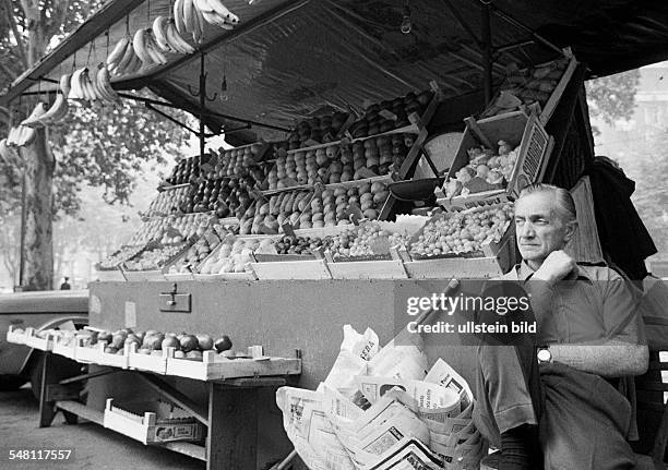 People, weekly market, market stall with fruit and vegetables, salesman, marketer, aged 60 to 75 years, Italy, Lombardy, Milan -