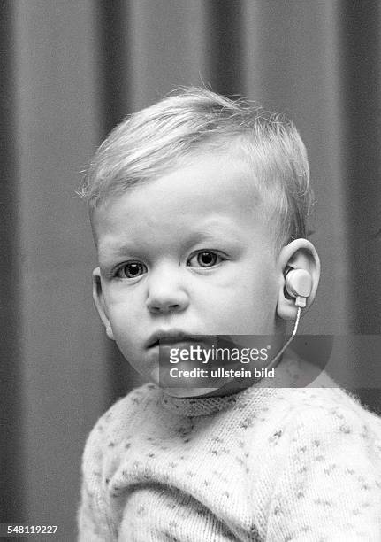 People, physical handicap, young boy with a hearing instrument in the ear, aged 2 to 3 years, Stefan, Special School Alsbachtal, D-Oberhausen,...