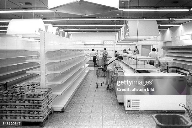 German Democratic Republic Bezirk Berlin East Berlin - supermarket on the last day before the currency union; empty shelves