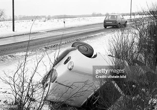 Traffic, car accident on a country road, passenger car lies in the roadside ditch, D-Bottrop, D-Bottrop-Kirchhellen, Ruhrgebiet, North...