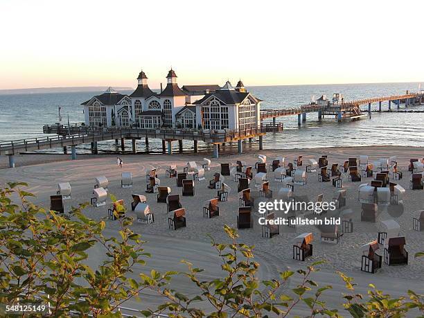 Germany - Mecklenburg-Western Pomerania - Sellin : pier and roofed wicker beach chairs at the seaside resort Sellin - 2009