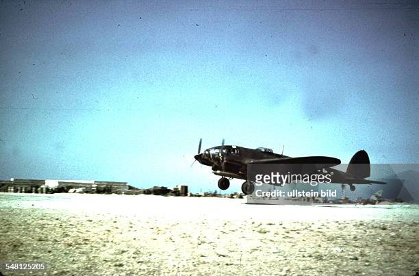 Greece Crete Iraklion: World War II A Heinkel He 111 of the German air force with two torpedoes under its fuselage landing at Heraklion airport -...