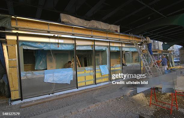 Germany Berlin Prenzlauer Berg - new building of the traditional snack bar Konnopke at the old location under the subway station Schoenhauser Allee -