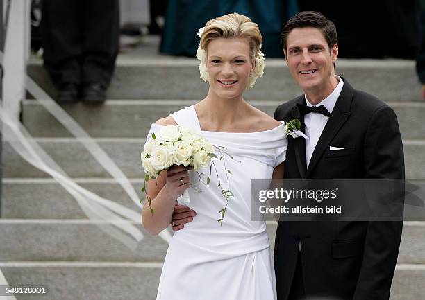 Riesch, Maria - Alpine Skier, Germany - and her husband Marcus Hoefl after their church wedding in Going, Austria