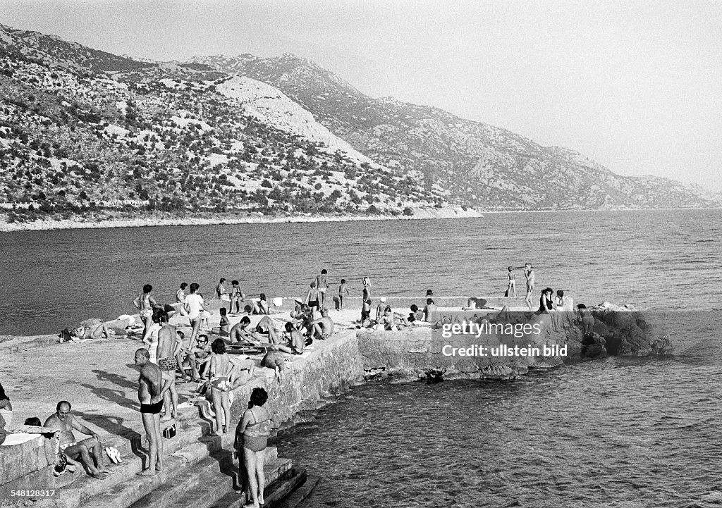 Holidays, tourism, bathing tourists, people take a sunbath, Croatia, at that time Jugoslavia, Yugoslavia, Mediterranian Sea, Adriatic Sea - 15.08.1974