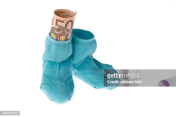 Baby socks and Euro banknote