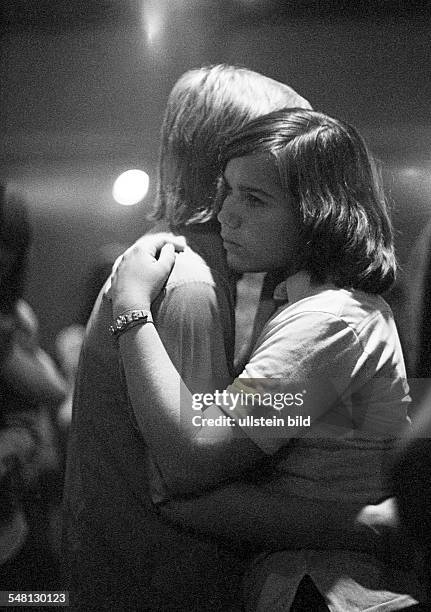 People, young couple in a disco, embracement, dancing, aged 16 to 20 years -