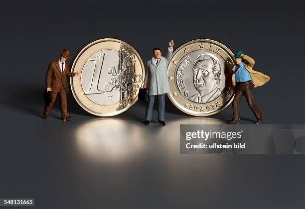 Spain - Spanish 1 Euro coin and businessmen