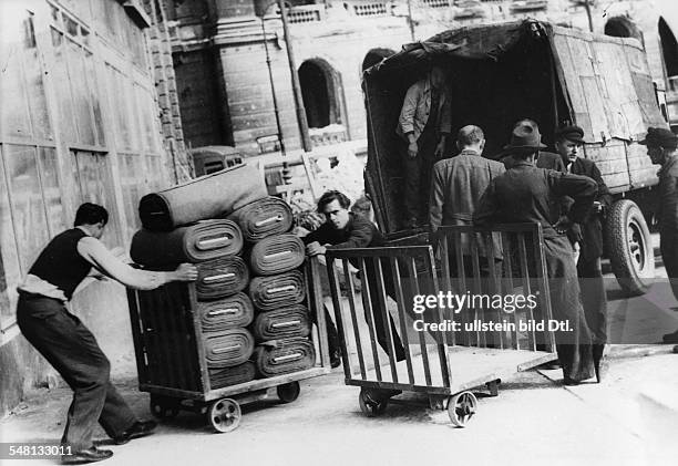 Germany 1945 - 1949, Post War Years Trade in Berlin Delivery of rolls of cloth for a factory - - Photographer: Walter Gircke Vintage property of...