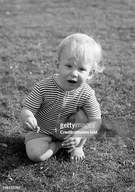 People, children, little girl playing on a meadow, aged 1 to 2 years, Judith -