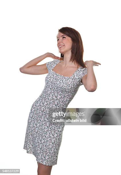 Young woman posing in a summer dress -