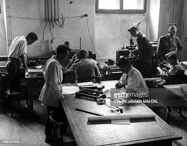Soviet Union Russian SFSR Moscow: Students in the physical lab of the Moscow University, on the table on the right Professor S.A. Akulev - around...
