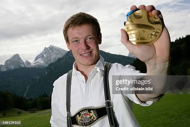 Loch, Felix - Athlete, Luge, Germany - presenting his gold medal of the 21st Olympic Winter Games Vancouver 2010 in his home town Schoenau am...