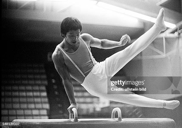 Sports, artistic gymnastics, competition 1974, Oberhausen versus Bayer Leverkusen, pommel horse, gymnast Hirata, man, aged 20 to 25 years,...