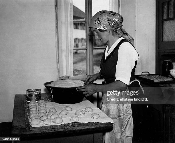 Federal Republic of Germany Bavaria : Bavarian peasant woman making yeast dumplings for a church festival - October 1951 - Photographer: Philipp...