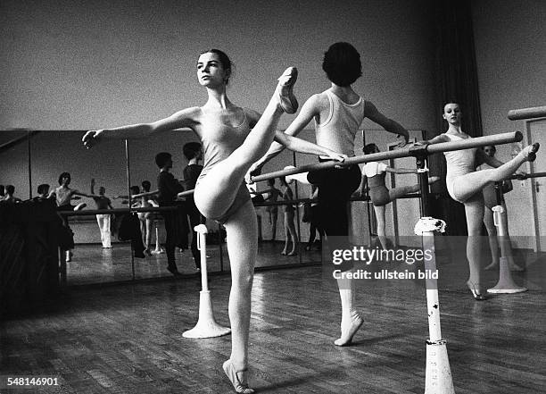 Federal Republic of Germany Baden-Wuerttemberg Stuttgart: Students of the John Cranko Ballet School doing exercises on the bar - 1978 - Photographer:...