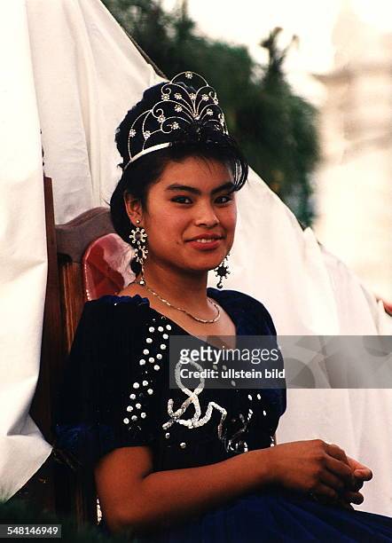 Guatemala. Young woman during a procession at New Year's Eve in Antigua. 1995