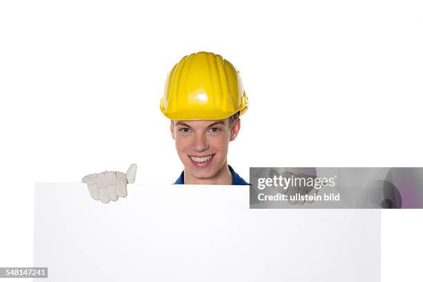 Young worker, apprentice, craftsman with blank sign - 2010