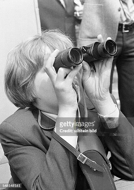 People, boy looks through a binoculars, lookout, sight worth seeing, jacket, aged 10 to 12 years -