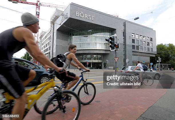 Switzerland Zurich-Kanton Zurich - Bicyclists in front of the building of the stock exchange