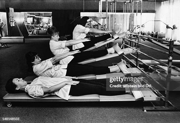 Women doing exercises in a gym - 1964 - Vintage property of ullstein bild