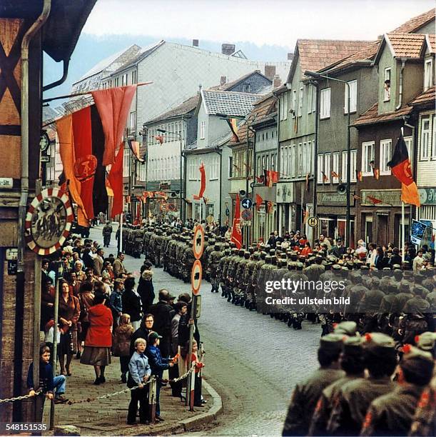 German Democratic Republic Heiligenstadt - brigade group is marching through the city on May Day