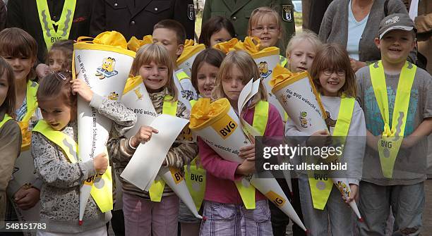 Germany Berlin Wilmersdorf - pupils of the Astrid-Lindgren-School at road safety education; high-visibility jacket for first grader -