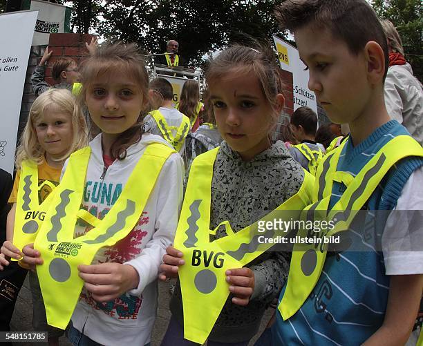 Germany Berlin Wilmersdorf - pupils of the Astrid-Lindgren-School at road safety education; high-visibility jacket for first grader -