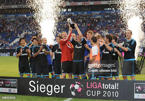 Germany North Rhine-Westphalia Gelsenkirchen - LIGA total! Cup 2010, final, FC Schalke 04 v FC Bayern Muenchen 3:1 - team Schalke celebrating during...