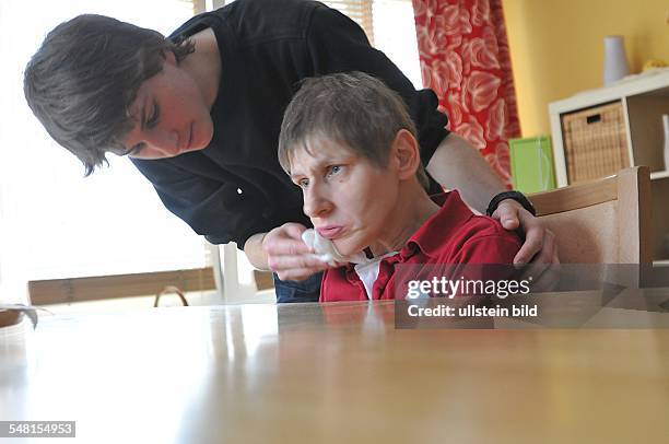 Germany Berlin Tempelhof - home for handicapped people of the Caritas organisation, house Lichtenrade, young man is doing alternative civilian...