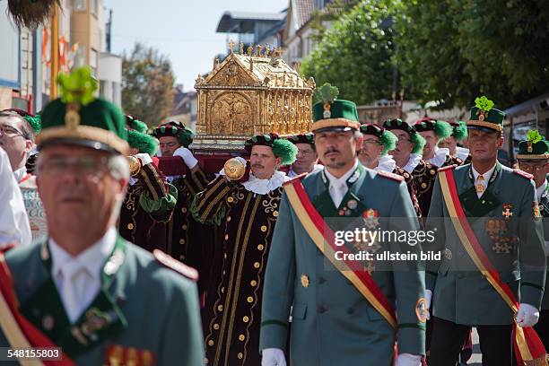 Germany North Rhine-Westphalia Paderborn - men carrying the holy shrine of Saint Liborius at Saint Liborius procession -