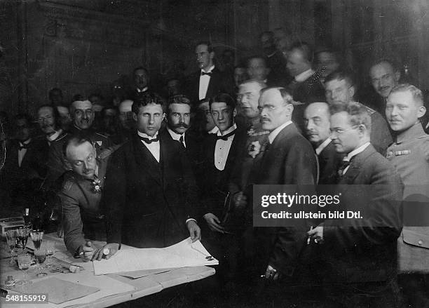 Signing of the Peace Treaty of Brest-Litovsk. View into the conference room: on the table German Major Brinkmann, then the representatives of the...