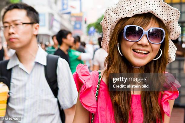 China Shanghai Shanghai - young stylish Chinese woman at Nanjing Don Lu shopping street