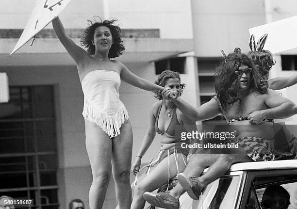 People, carnival procession, sexuality, two young girls and a man on a festival carriage, semi-nude, aged 20 to 30 years, aged 30 to 40 years,...