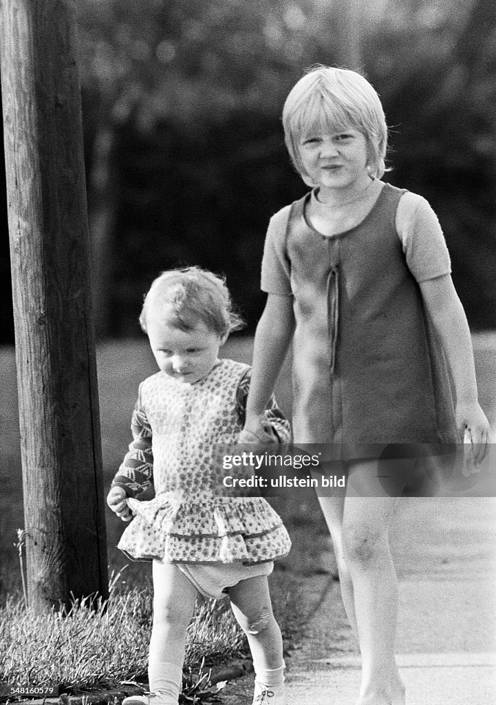 People, children, girl and younger sister going hand in hand for a walk, aged 6 to 9 years, aged 3 to 4 years - 07.08.1972