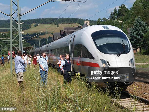 Germany Thuringia Probstzella - ICE train from Munic to Hamburg with a broken-down power car is waiting for a breakdown train -