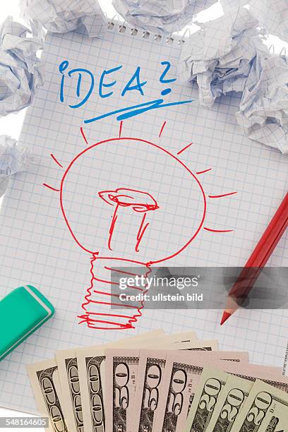 Bulb on a drawing as a symbol of new ideas
