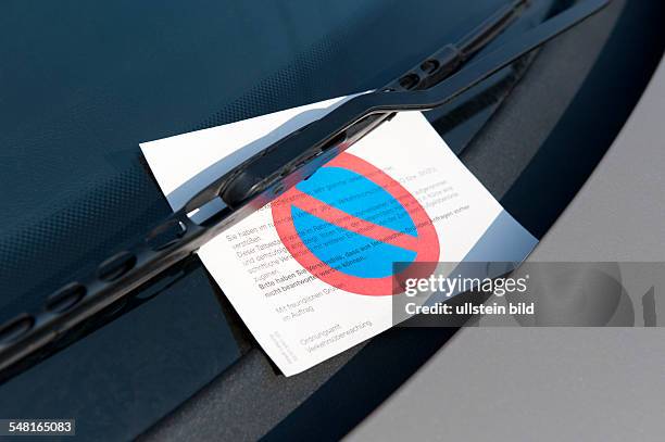 Germany Saxony Leipzig - parking ticket at a windsreen of a car