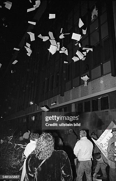 German Democratic Republic Bezirk Berlin East Berlin - Cititzens are storming and occupying the headquarters of the Stasi at the street...