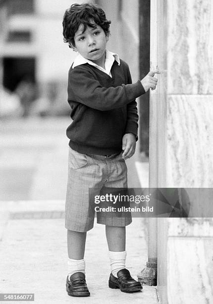 People, children, little boy stands near a wall, Spaniard, aged 5 to 7 years, Spain, Canary Islands, Canaries, Tenerife -