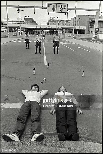 Germany, Berlin, Protest campaign on occassion of the 25th anniversary of the Berlin wall building at the allied border crossing Checkpoint Charlie...