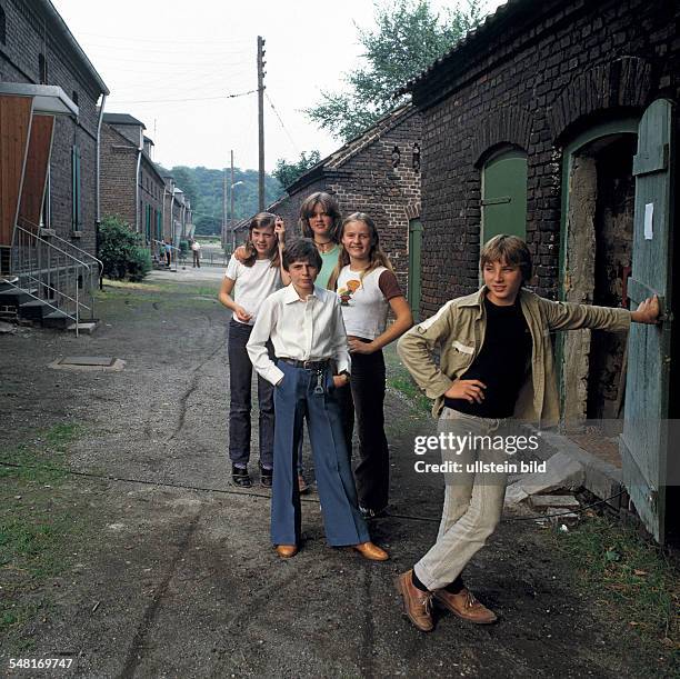 Germany North Rhine-Westphalia Oberhausen - people, juveniles pose in the mining settlement Eisenheim -
