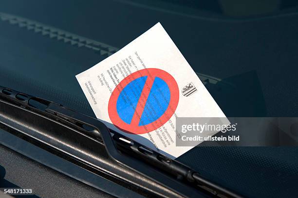 Germany Saxony Leipzig - parking ticket at a windsreen of a car