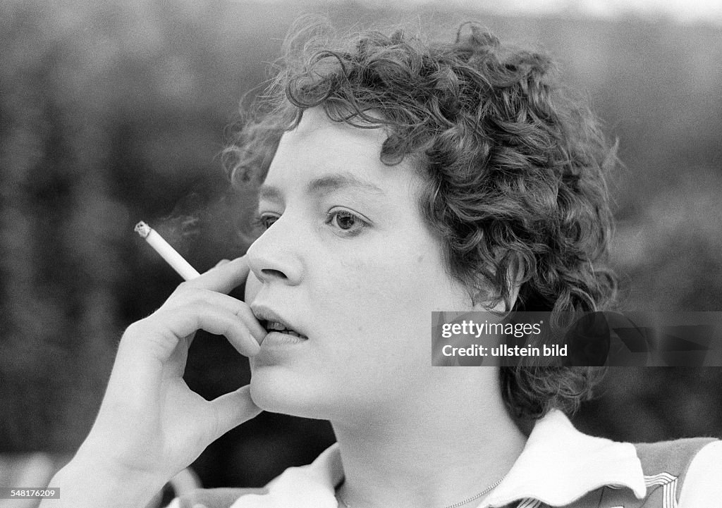 People, young woman holds a cigarette in her hand, portrait, aged 23 to 28 years, Monika - 20.05.1976