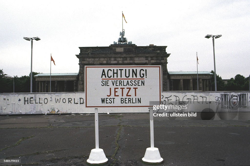 Germany Berlin (West) - Berlin Wall at Brandenburg Gate, sign: Achtung! Sie verlassen jetzt West Berlin