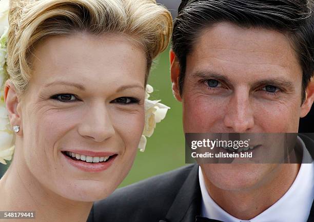 Riesch, Maria - Alpine Skier, Germany - and her husband Marcus Hoefl after their church wedding in Going, Austria