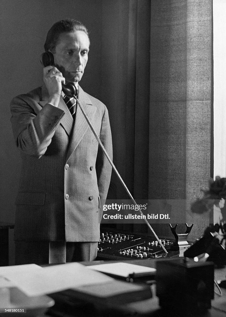Joseph Goebbels *29.10.1897-01.05.1945+ Politician, Nazi Party, Germany - on the phone in his study - late October 1933 - Photographer: James E. Abbe - Vintage property of ullstein bild