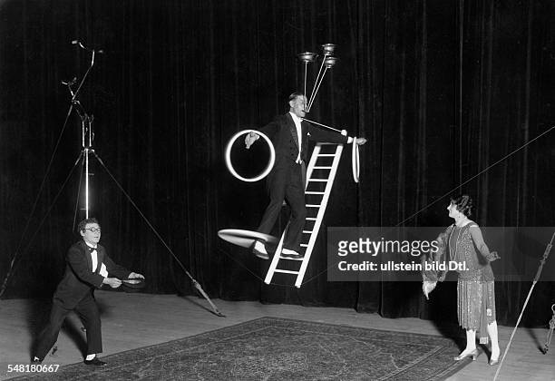 German Empire, artists: "Janowsky Trio" during a performance walks a tightrope at "Scala" Berlin - Photographer: Zander & Labisch - 1927 Vintage...