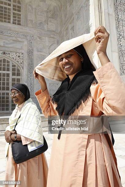 India Uttar Pradesh Agra - Christian nuns in the Taj Mahal